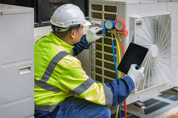 Professional Air Conditioning Repair technician working in Forest, IN